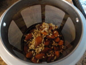 Soaked almonds and oats in Almond Cow basket